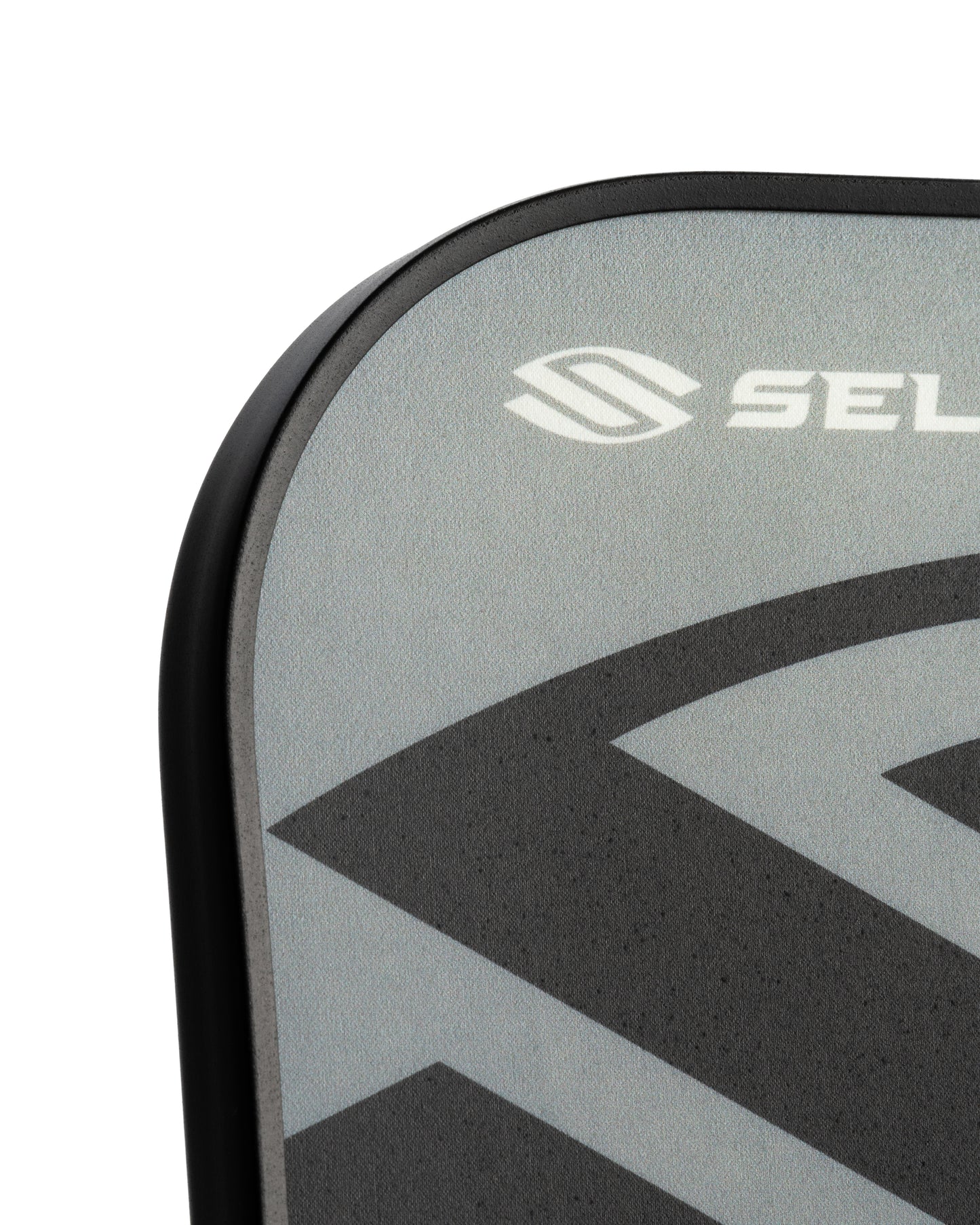 Close-up of a grey and black pickleball paddle, showcasing its textured surface and lightweight design.