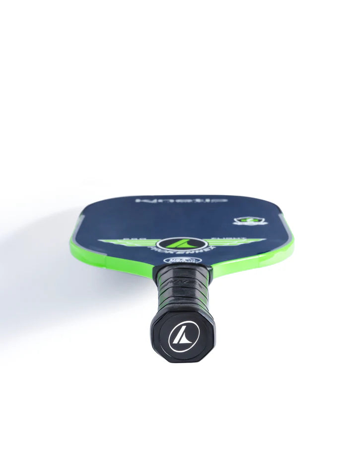 Pickleball paddle with navy blue and lime green face, black grip, and logo detail.