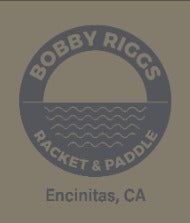 Navy blue circular logo on olive background; "Bobby Riggs Racket & Paddle, Encinitas, CA"