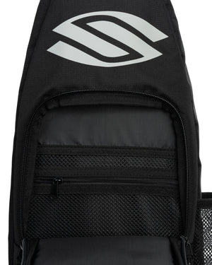Black pickleball sling bag interior; multiple pockets & mesh compartments.