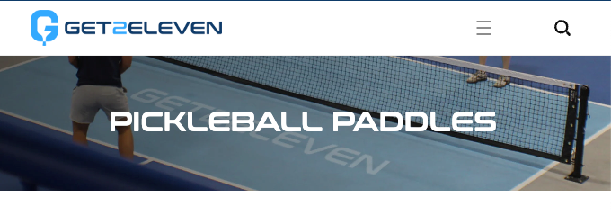 Pickleball players on a light blue court, near a net.