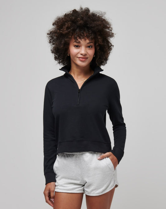 Travis Mathew Cloud 1/2 zip pullover: Black cropped sweatshirt with half zip, comfortable and stylish.

