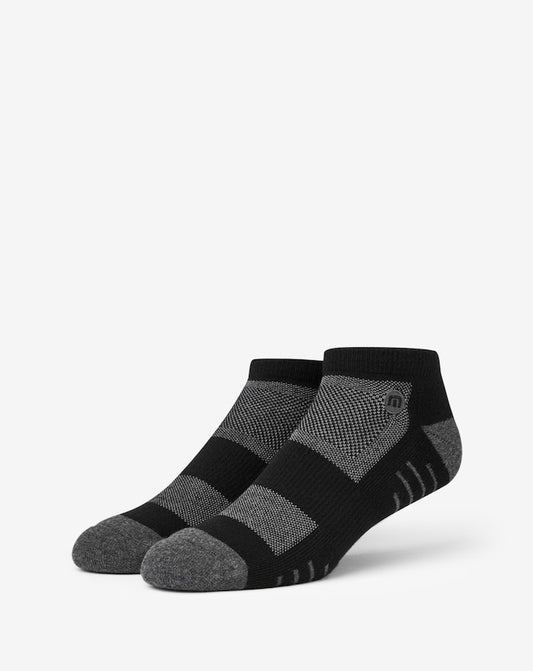 Travis Mathew Eighteener 2.0 ankle socks: black & gray athletic socks with textured design.
