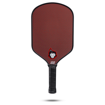 Red and gray carbon fiber pickleball paddle with black grip; USA Pickleball Approved.
