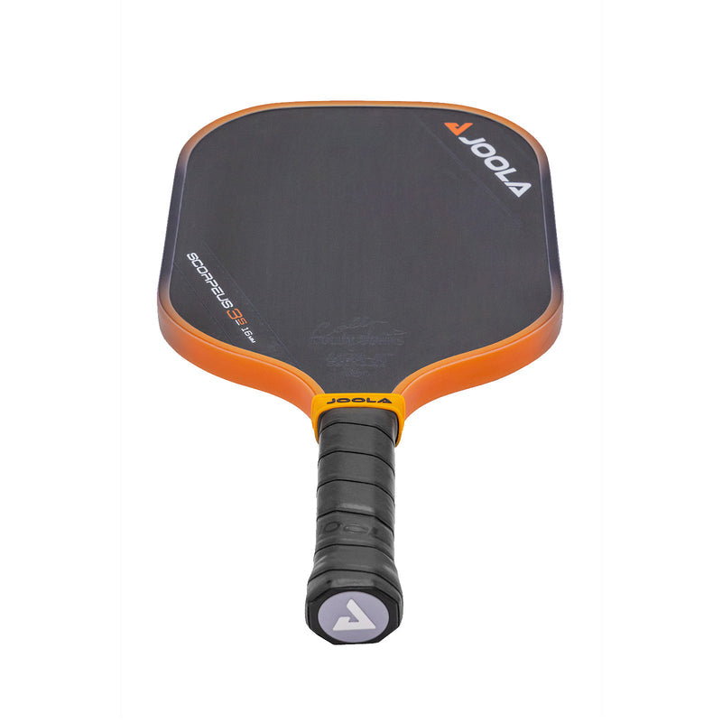 Black and orange pickleball paddle with textured grip, shown against a white background.
