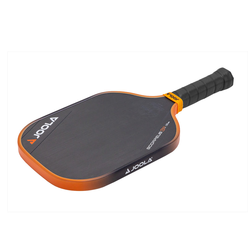 Black pickleball paddle with orange accents, comfortable grip.
