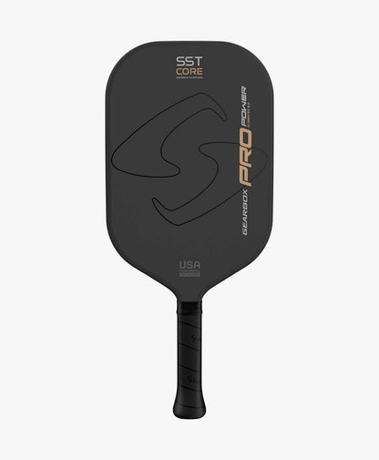 Black elongated pickleball paddle with textured grip, USA Pickleball Approved.
