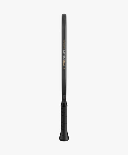 Black elongated paddle, close-up view showcasing textured grip.
