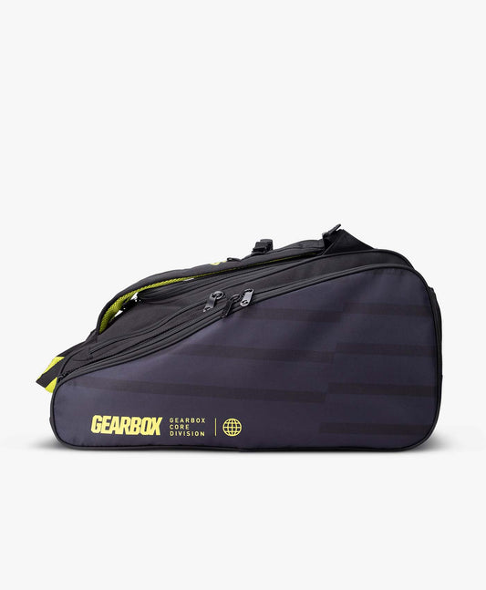 Gearbox Core Collection Ally Bag: Black nylon athletic bag with yellow accents and striped design.
