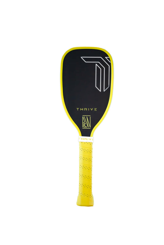 Thrive Training Paddle - Yellow Will Edition: black & yellow pickleball paddle with perforated grip
