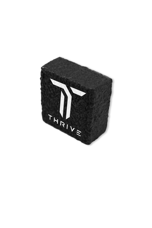 Thrive Paddle Eraser: Black textured paddle eraser with white logo
