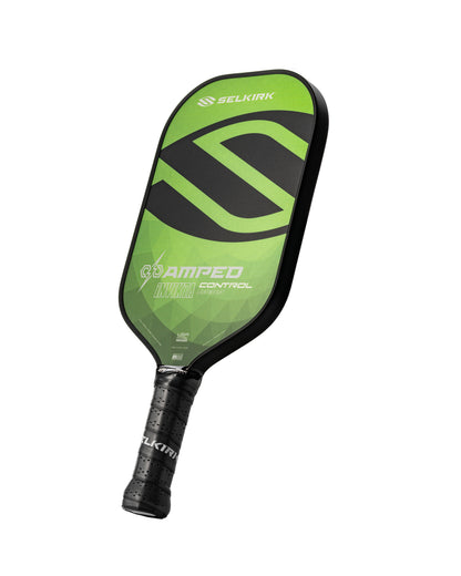 Green and black pickleball paddle with a lightweight design, shown against a white background.
