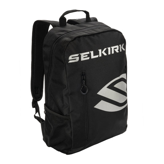 Selkirk Core Line Day Backpack: Black backpack with reflective logo, ideal for sports & everyday use.

