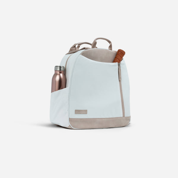 Doubletake Melbourne Pickleball Backpack/Tote: White with tan accents, spacious design, holds paddle & water bottle.
