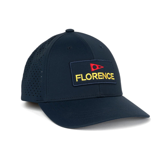 Navy blue Florence Airtex trucker hat with breathable side panels and embroidered logo.
