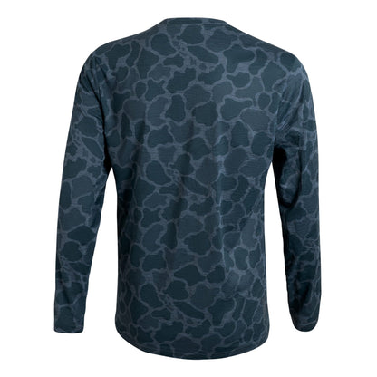 Long-sleeve shirt, dark teal abstract print, shown from the back.
