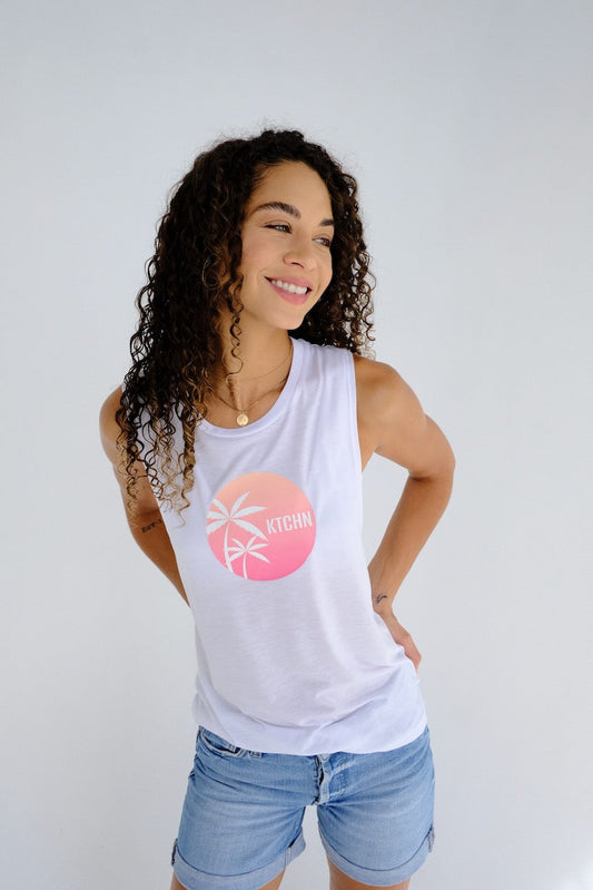 KTCHN Aloha Muscle Tank: White cotton muscle tank with pink palm tree graphic.
