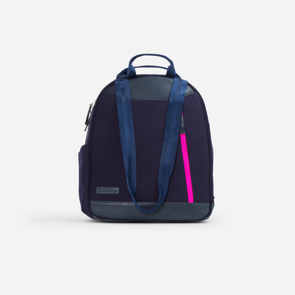 Navy blue pickleball backpack with pink zipper detail and dark gray leather trim.
