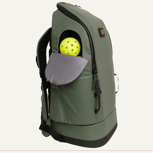 FORWRD Court Caddy Pickleball Backpack: Olive green pickleball backpack with dedicated ball pocket.
