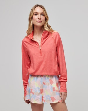 Travis Mathew Tulum Weekend Pullover: Coral 1/2 zip pullover with coordinating floral shorts.
