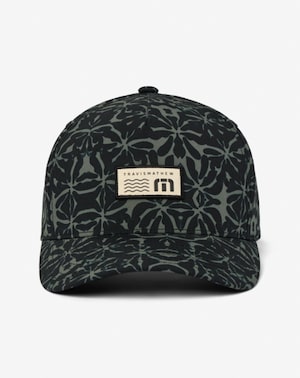 TravisMathew Thundercloud Hat: Dark green, floral-print baseball cap with embroidered logo.
