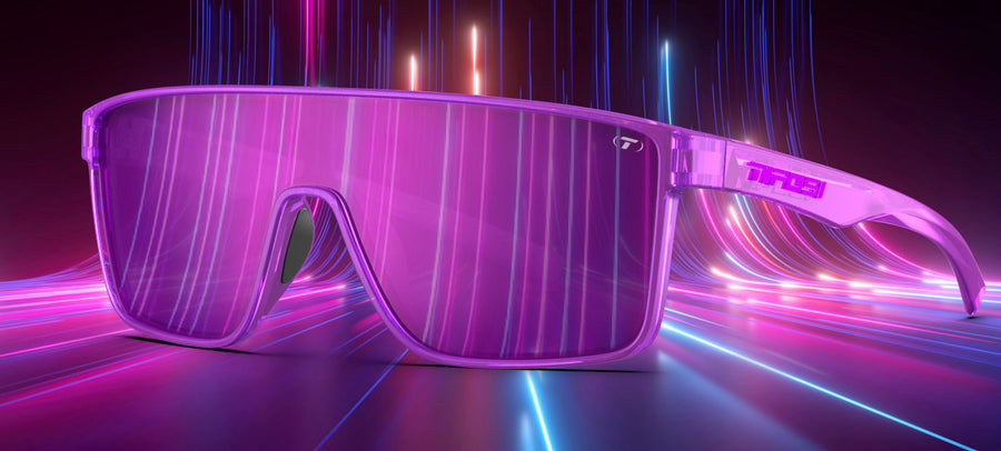 Purple mirrored sunglasses displayed against a vibrant, neon background.
