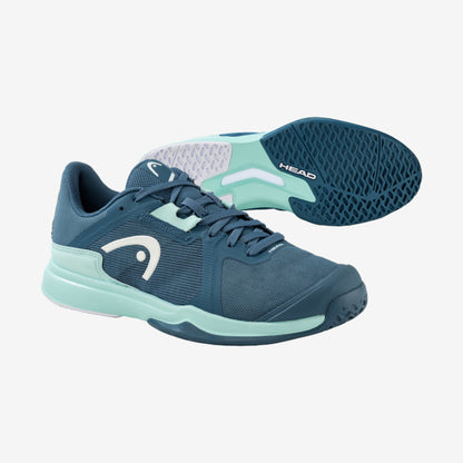 Women's teal tennis shoes with mint green sole, shown on white background.
