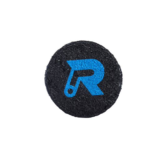 Ronbus Pickleball Paddle Eraser: Black, round grip enhancer with blue logo.
